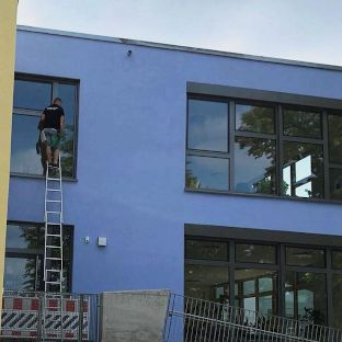 Fensterreinigung an schwer zugänglichen Stellen